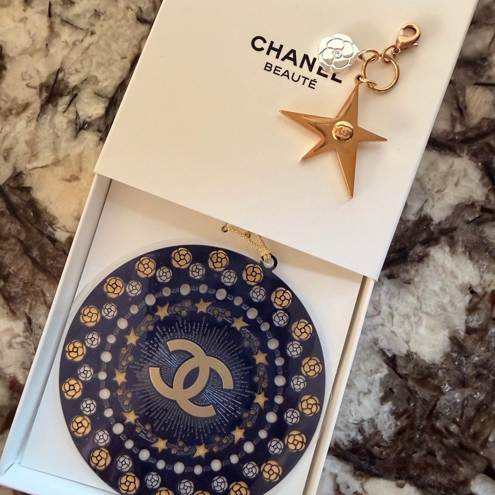 CHANEL Gold and Silver Star Charm on White Box